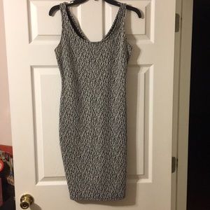 Sexy Bar lll Dress with small slit on one side